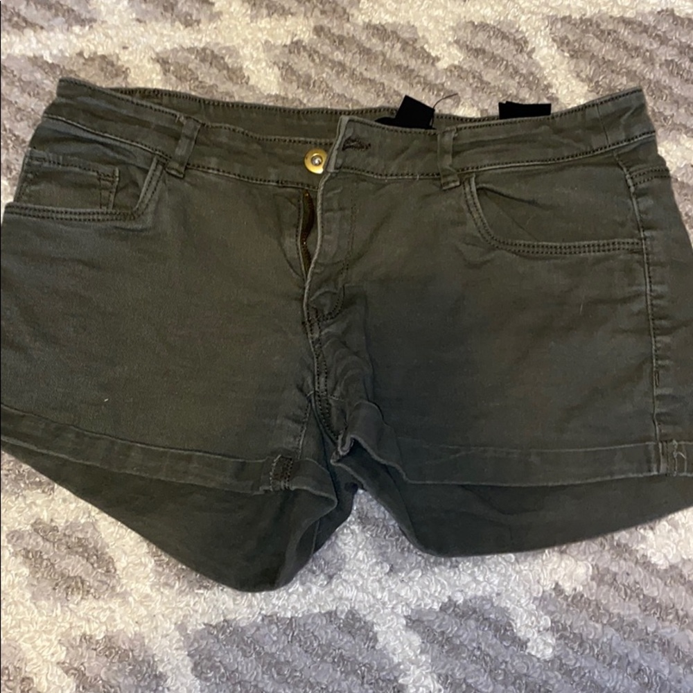 green denim shorts